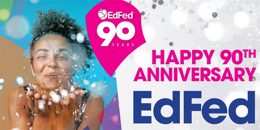 A woman blowing bubbles against a colorful backdrop. The words at the bottom right: happy 90th anniversary EdFed