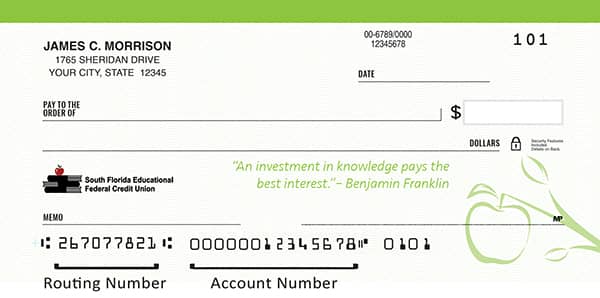 Green sample EdFed check highlighting the location of the routing and account numbers.
