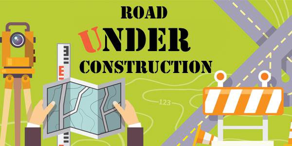 An illustration of hands holding a map superimposed over road construction equipment.