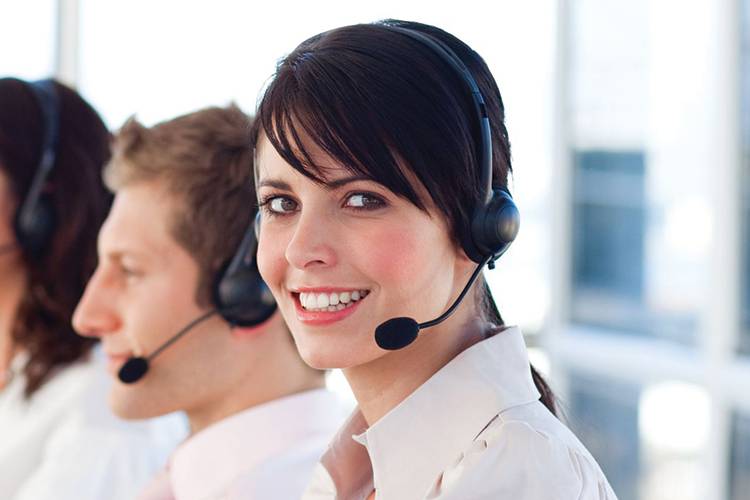 Smiling Contact Center woman with headset.