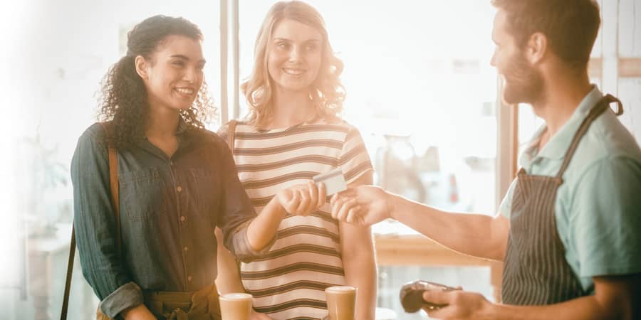 A happy, young boy with glasses wearing a sports coat and a tie. To his left, a speech balloon with the words: Woo-hoo! Get Excited! It's time to save!